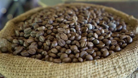 Close up man hand grab brown coffee bean for coffee concept Stock Footage 120815071