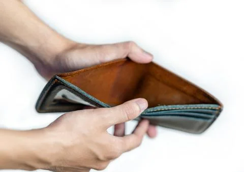 Close up man hand opening empty wallet. Stock Photos