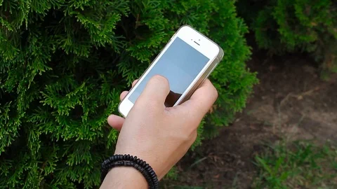 Close up man hand with phone Stock Footage 78699585