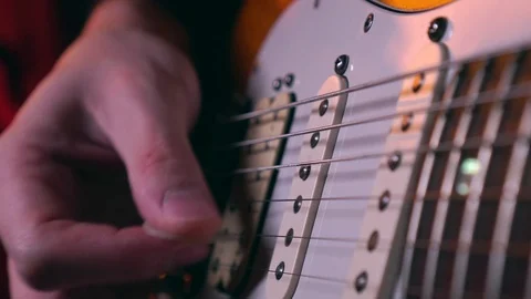Close up of Man Hand Playing Electric Guitar Stock Footage 123858530