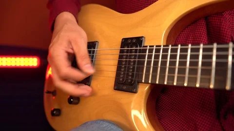 Close up of man hand playing the funky rhythm on electric guitar Stock Footage 121359778