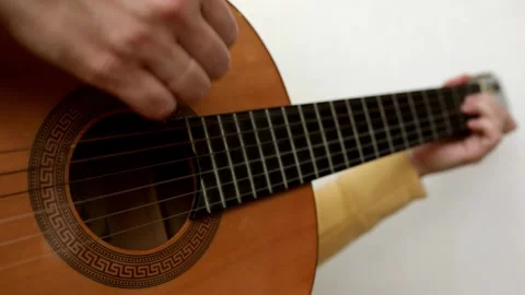 Close up of man hand playing guitar. Stock Footage 244704854
