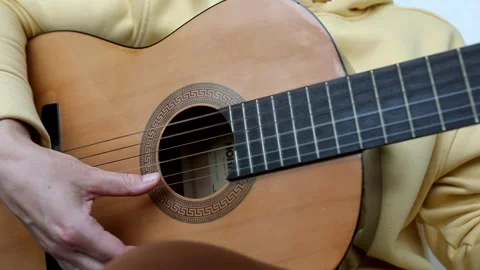 Close up of man hand playing guitar. Stock Footage 244704868