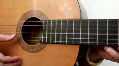 Close up of man hand playing guitar. Stock Footage 246035320
