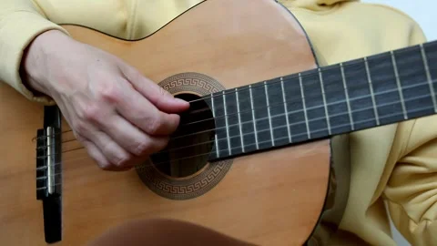 Close up of man hand playing guitar. Stock Footage 246443407