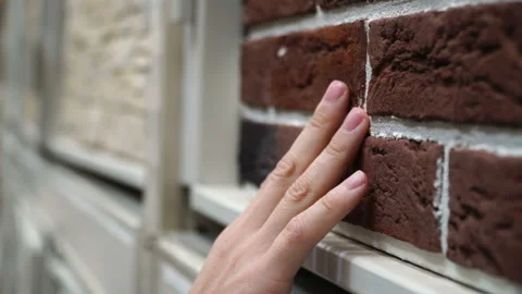 Close up man hand touching sample of wall material at shopping mall Stock Footage 88129458