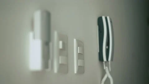 Close-up of man hand turning on the light with a wall switch Stock Footage 169183107