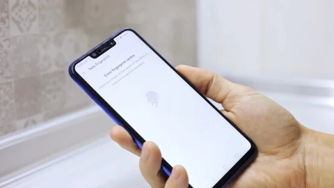 Close-up man hand use application on the smartphone, the man applies his finger Stock Footage 99314426