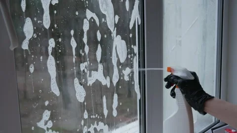 Close Up Man Hands with Black Gloves Cleaning a Window Using Sprayed Liquid Vídeos de archivo 235930239