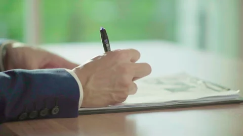 Close up man hands in blue suit signing document 60fps Stock-Footage 156031324