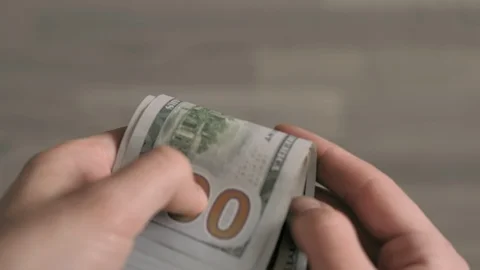 Close up of man hands count dollar bills. Money calculation. Stock Footage 127512346