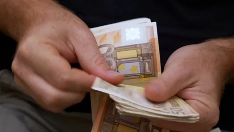 Close up on man hands counting large amount of money Stock Footage 83416880