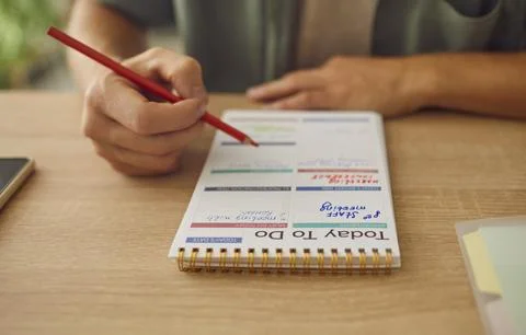 Close-Up of Man Hands Crafting Schedule in Notebook Stock Photos