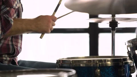 Close up of man hands with drum stick. Man is Playing music Stock Footage 155553931