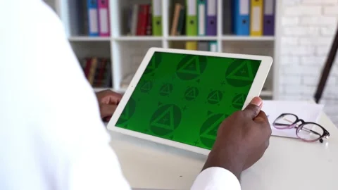 CLose up of man' hands with green screen tablet. Chroma key mock up Stock Footage 197442473