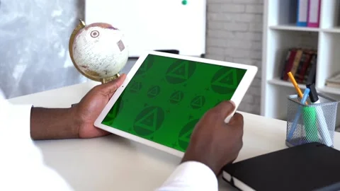 CLose up of man' hands with green screen tablet. Chroma key mock up Stock Footage 197442474