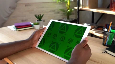 CLose up of man' hands with green screen tablet. Chroma key mock up Stock Footage 197442502