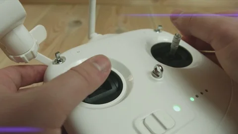 Close Up of man hands moving drone controller levers Stock Footage 75355320