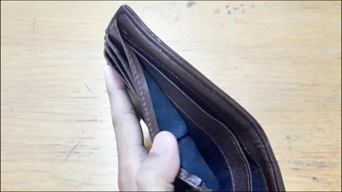 Close-up of man hands open an empty wallet, Bad economics situation. Video stock 288975478