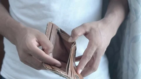 Close up Man hands opening an empty wallet Financial crisis No money poverty Stock Footage 336450654