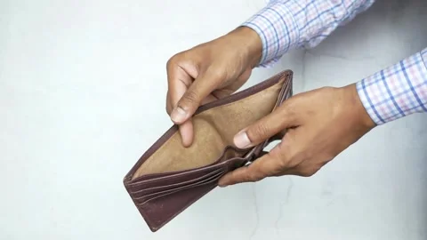Close up Man hands opening an empty wallet Financial crisis No money poverty Stock Footage 336450658