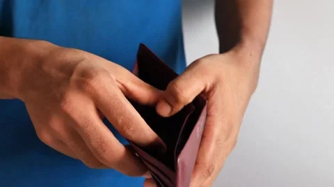 Close up Man hands opening an empty wallet Financial crisis No money poverty Stock-Footage 336450665