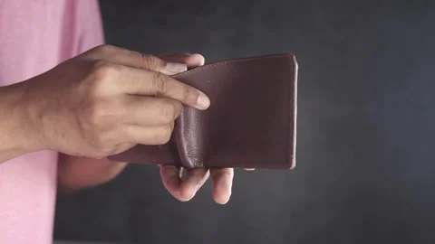 Close up Man hands opening an empty wallet Financial crisis No money poverty Stock Footage 336450666