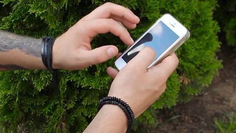 Close up man hands with phone Stock Footage 78699594