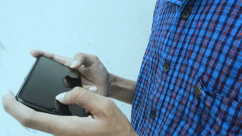  Close up of man hands playing games on smart phone. Stock Footage 132520798