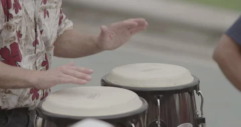 Close-up of Man hands playing percussion on a street Stock Footage 150435292