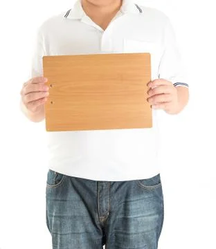 Close up of man hands showing wooden blank board Stock Photos