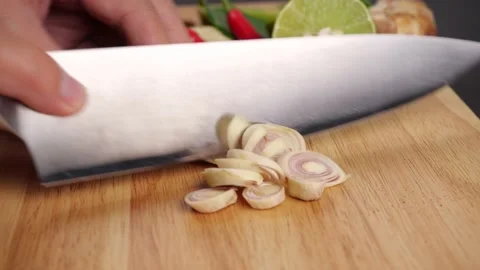 Close-up of Man hands slice lemon grass in pieces on cutting board Stock Footage 141096320