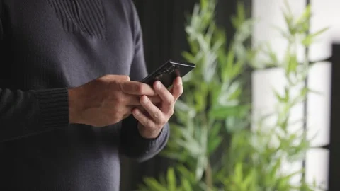Close Up of Man Hands Texting on Smartphone Stock Footage 346810701