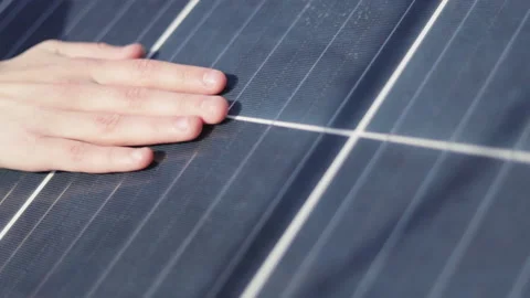 Close up man hands touch solar batteries Video stock 167839830