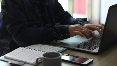 Close up of man hands typing on the keyboard of computer laptop for writing work Stock Footage 273059418