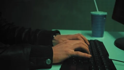 Close up of man hands typing on a laptop computer keyboard, indoors. Stock Footage 111487900