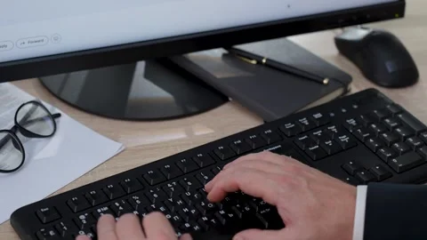Close-up of man hands typing pc keyboard. Businessman using computer keyboa.. Stock Footage 288856165