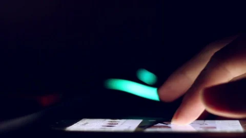 Close up of man hands typing scrolling pictures phone at night. Stock Footage 90800191