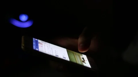 Close up of man hands typing scrolling pictures phone at night. Stock Footage 92193852