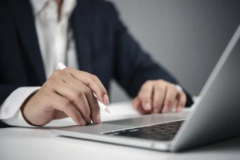 Close-up of man hands using computer, remote work, data entry, professional.. Stock Photos