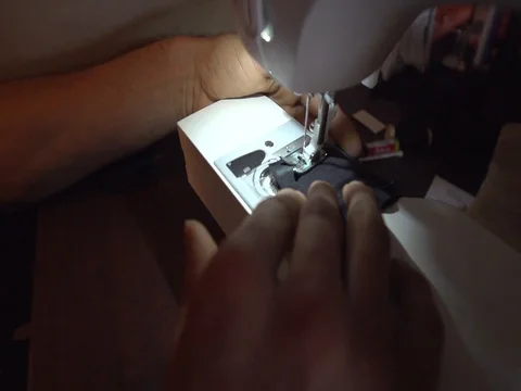 Close up Man Hands Using Sewing Machine Stock Footage 80164521
