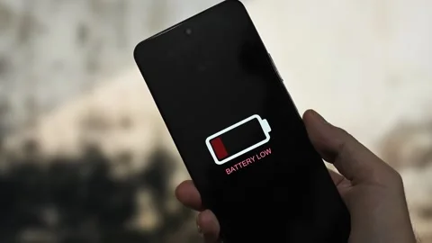 Close up man hands using smart phone battery low charged battery screen Stock Footage 340509902