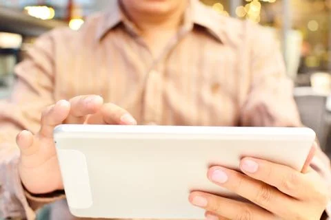 Close Up  Man Hands Using Tablet connecting wifi, Shallow depth of field. Stock Photos