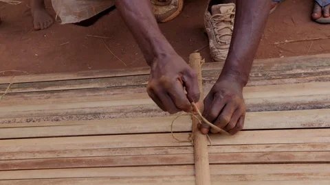 Close up of man hands working the bamboo Stock Footage 107309626