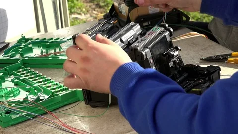 Close-up on the Man hands of the working with Optical fibre communication panel 動画素材 83548811