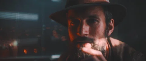 Close up of man in hat using vintage camera Stock Footage 203567331