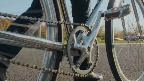 Close-up, A man in a hat walking with a stylish, chrome Bicycle. Retro bike Video stock 121807796