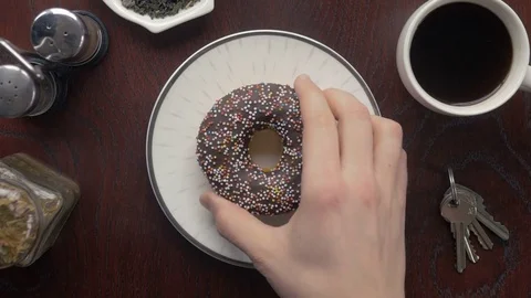 Close-up of man having a breakfast in his vintage kitchen Stock-Footage 74493070