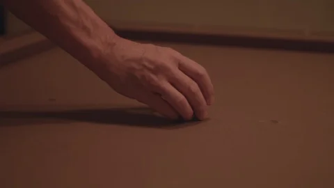 Close up of a man hitting the cue ball and breaking on a pool table in 4k. Stock Footage 88685545