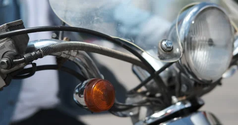 Close-up of man holding motorcycle accelerator Stock Footage 136355897